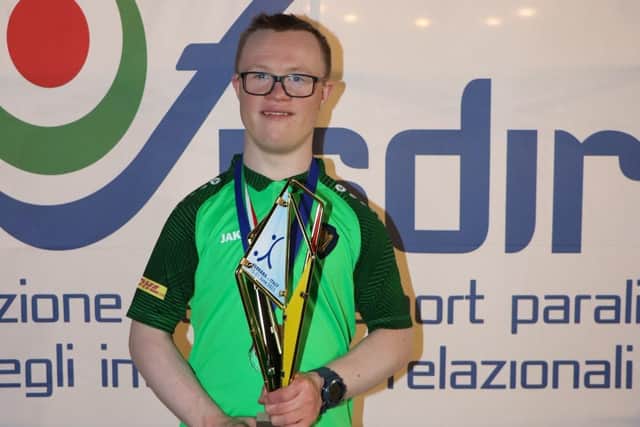 ​Micheál pictured with his trophy and bronze medal.