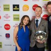 Paul receives his award from Mia McKenna-Bruce and Roman Kemp.  Photo: Fanny Beckman