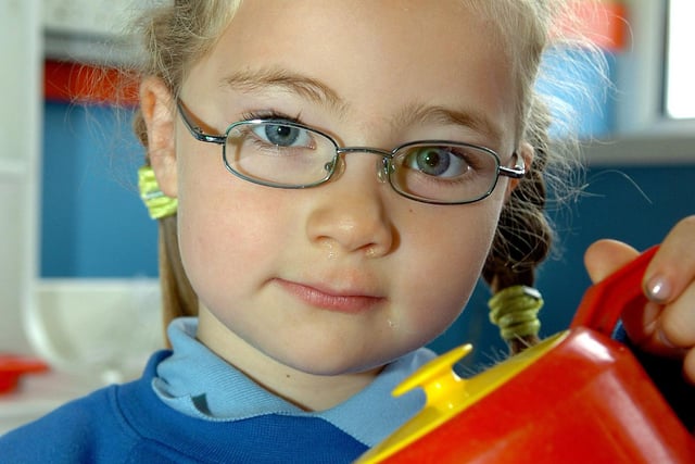 Emily takes time out to pose for our lensman on her first day of school life at Bellaghy Primary School in 2007.