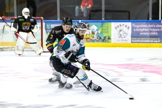 Belfast Giants’ Pierre-Olivier Morin with Nottingham Panthers’ Cooper Zech during Sunday night's Elite Ice Hockey League game at the Motorpoint Arena, Nottingham. Photo by William Cherry/Presseye