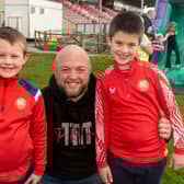 Mark Beattie and sons, Blake (5) and Jackson (8) enjoying the day out at the We Are Ports fun day. PT17-246.