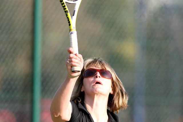 REACH FOR IT...Anne Clarke in action during the Coleraine Tennis Club Valentine match back in 2008.