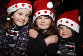 HAT'S GREAT...Taylor, Carly and Andrew having fun during the switchING on of the Christmas Lights in Coleraine in 2010.
