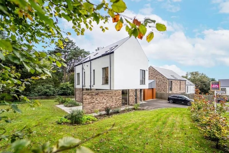 On the market for offers over £999,950 with Independent Property Estates, this contemporary detached residence is set on a 1.3 acre site with manicured lawn gardens and a private woodland area.  Designed by BGA Architects with bespoke interiors by renowned designer Kris Turnbull, it was built in 2017 and completed in 2019 by AKM Construction.  The property, which has six double bedrooms and three reception rooms, benefits from stunning sea and Belfast Lough views from the third floor.