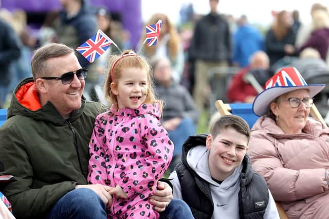 Enjoying the big-screen broadcast of the royal event at Marine Gardens in Carrickfergus. Pics Steven McAuley/McAuley Multimedia