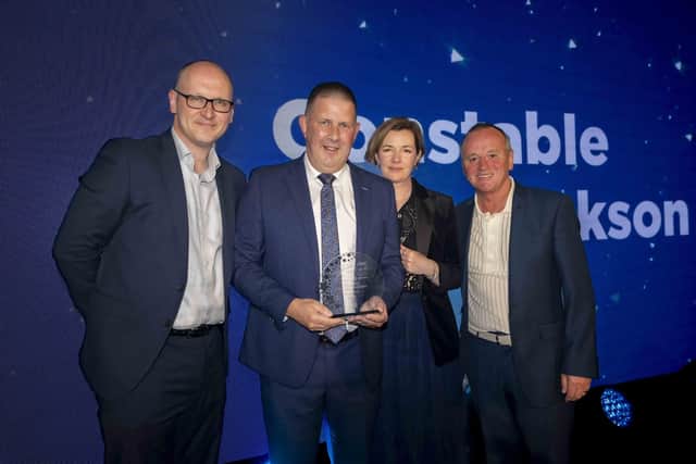 Constable Stephen Dickson has been named Northern Ireland’s ‘999 Hero’ at the Spirit of Northern Ireland Awards 2025 for his tireless campaigning to make our roads safer through raising road safety awareness. Stephen received the prestigious award from Four Star Pizza Marketing Director Sean Scott and stars of the popular Blue Lights TV series, Joanne  Crawford and Paddy Jenkins. Pic credit:  Spirit of Northern Ireland Awards