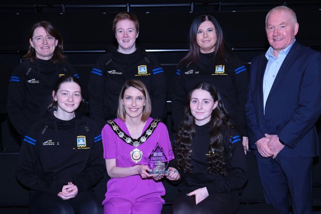 Pictured at the Civic Awards with Chair of the Council, Councillor Córa Corry are the St Colm's Draperstown Under 20 Ulster champions with nominating councillor Brian McGuigan.