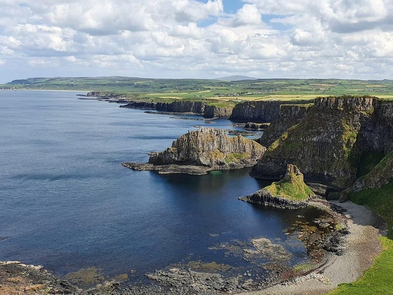 The north coast cliff walk is a favourite of many people including John Watson McGonigle. He shared this great photo taken approximately one mile west of Dunservrick Castle. He points out that you can see Knocklayde mountain in the distance.