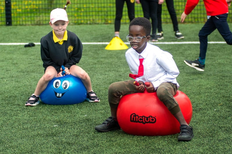 On the bounce...pupils having fun together in Portadown People's Park. PT23-255.