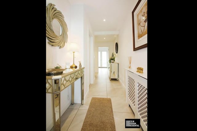 Entrance hallway with tiled floor.