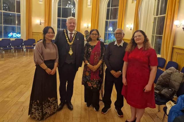 Celebrating Moon Festival are Bonnie Cooper, Wee Tea House, Mayor of Causeway Coast & Glens Council Cllr Steven Callaghan, Indu and Naresh Jairath, Claire Louise McBride. Credit MW Advocates