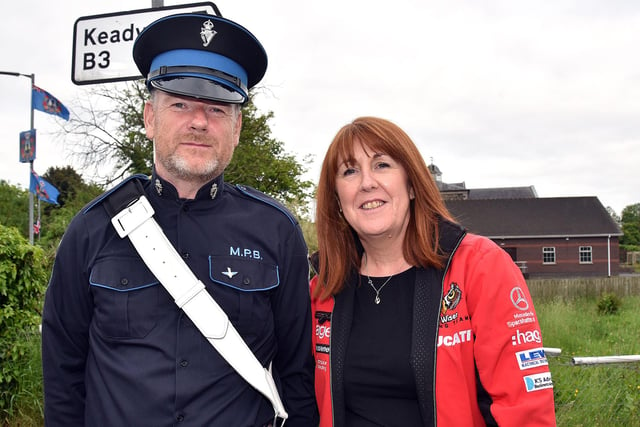 Anthony Fleming of Markethill Protestant Boys Band and Hayley Gray pictured at the Mullabrack Accordion Band 40th Anniversary parade in Markethill on Friday night. PT22-204.