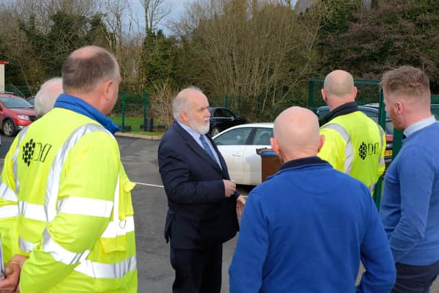 Mid Ulster MP Francie Molloy pictured (centre) at the meeting at Sacred Heart Primary School, Rock, to discuss safety measures. Credit: Submitted