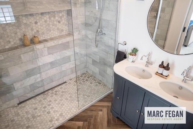 The master bedroom comes with the most stunning en-suite complete with his and hers showers and wash hand basins.