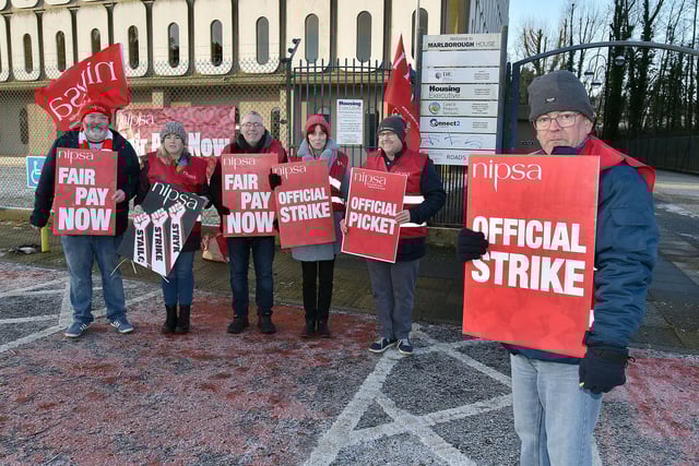 Striking civil servants pictured at Marlborough House on Thursday morning. PT03-237.