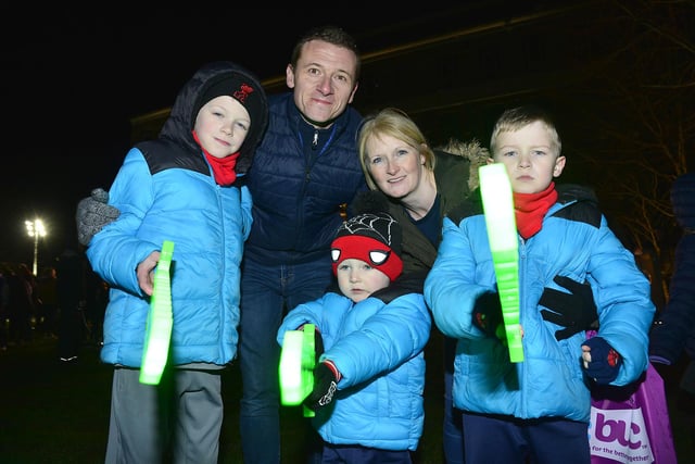 The Parker family wrapped up warm to enjoy the switch on at Mossley Mill.