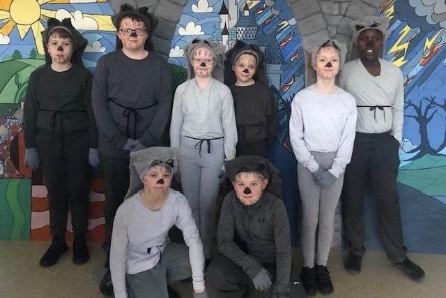 The wolves pictured in Mossley Primary's production of Beauty and The Beast.