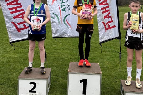 (L-R): Gethin Davies, Fivemiletown Primary School (2nd), Donnacha McCullagh, St Dympna’s Primary School (1st), and Damian McAleer, St Dympna’s Primary School (3rd) at the third round of the 2024-2025 Flahavan’s Athletics NI Primary School Cross Country League at Dungannon Park.