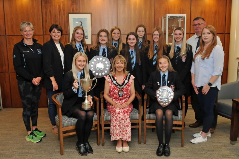 Lord Mayor of Armagh City, Banbridge and Craigavon, Councillor Margaret Tinsley with Portadown College First and Second Girls Hockey Teams members who won the 1st XI Schools Plate and the 2nd XI McDowell Shield. Included are, Mrs Alison Symington, Head of Girls PE, Mr Ivor Lennon, Girls Hockey Coach, Councillor Julie Flaherty and Councillor Kate Evans.