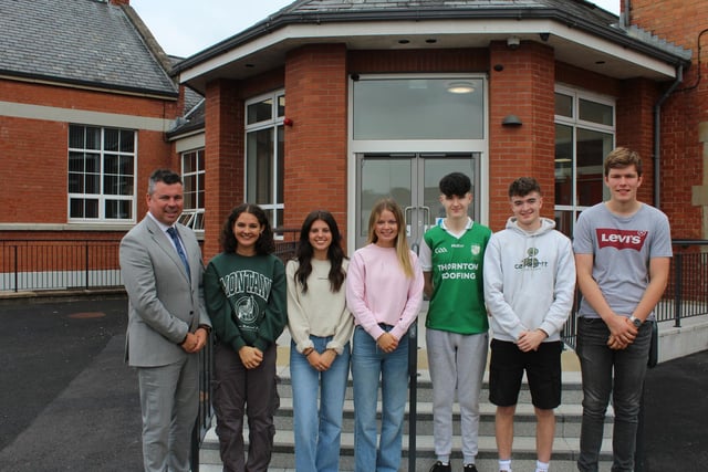 Pupils who achieved 3A Star A2 pictured with Rainey Endowed principal Mr Mark McCullough.