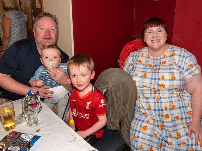 It was a family occasion at the Daniel Wiffen watch party on Sunday in Byrne's Bar, Magheralin. Pictured showing their support for the local swimmer are the McGee family including, dad, Connor, Dara (1), Thomas (5) and mum, Maggie, LM32-209..