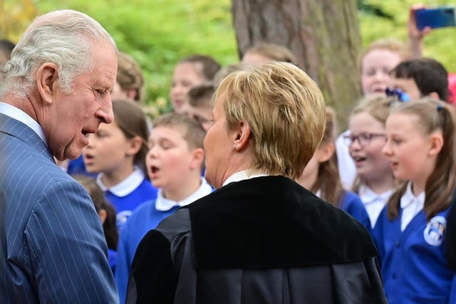 King Charles chats to Antrim and Newtownabbey Borough Council chief executive Jacqui Dixon during his visit to Hazelbank Park in Newtownabbey.Picture: Colm Lenaghan/Pacemaker