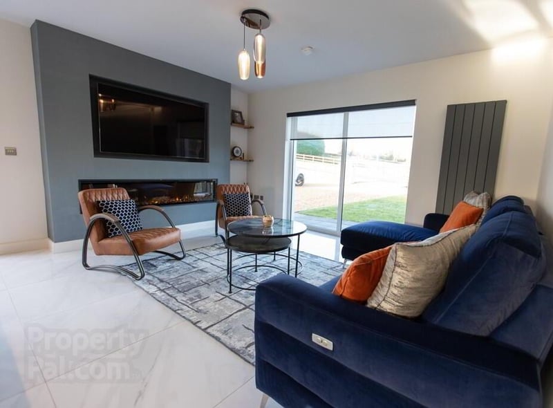 The living area has a cosy feature electric fire.