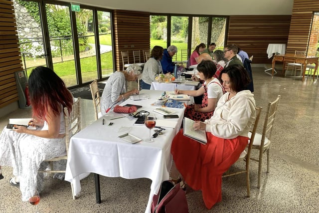 Artists at work during a meet-up at Ballygally Castle.