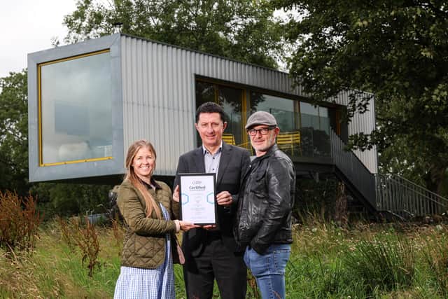 David Roberts, Director of Strategic Development at Tourism NI (centre), pictured with Victoria and Patrick Bradley, owners of Barney’s Ruins. Credit: Supplied