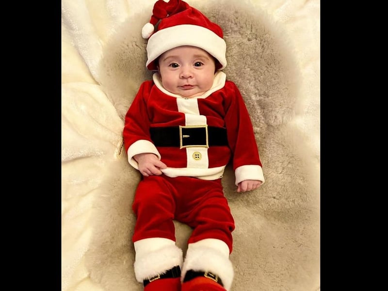 A Santa outfit for little Sebastian.