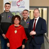 Minister Gordon Lyons MLA alongside Mayor of Mid and East Antrim Ald Gerardine Mulvenna with James, Jayden and Dean from Larne YMCA. (Pic: Contributed).