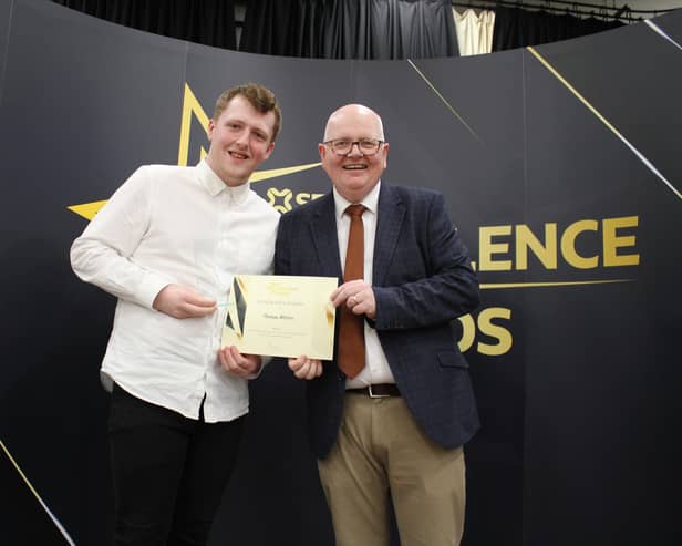 Dave Linton founder and Managing Director of social enterprise luggage company Madlug presented the certificates and trophies for the Further Education Student of the Year Awards. He is pictured with award winner for the School of Health, Early Years and Adult Education, Thomas Worton.