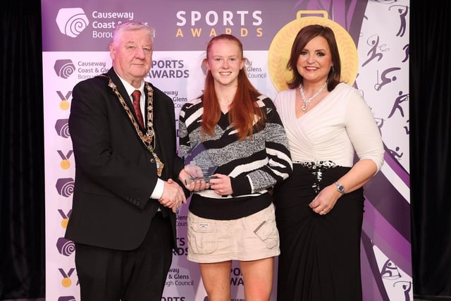 Junior Sportswoman of the Year, Kia McCartney accepts her award from Denise Watson and Mayor, Councillor Steven Callaghan.