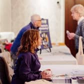 Attendees engaging with service providers