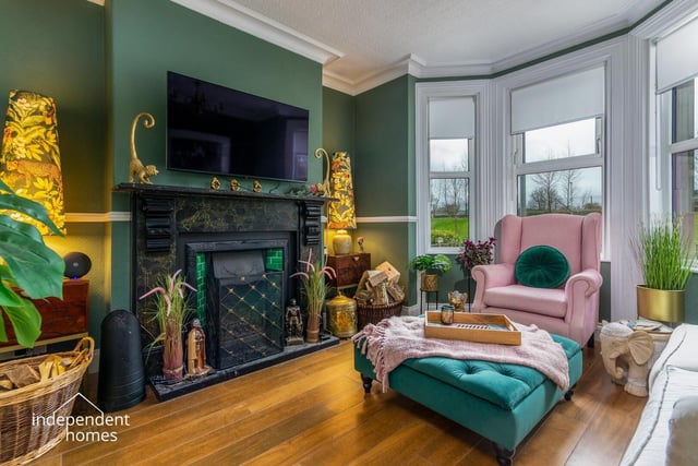 Striking living room with feature fireplace.