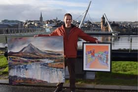 Adrian Margey pictured with some of his work ahead of this weekend's exhibition at Ebrington. Credit Adrian Margey