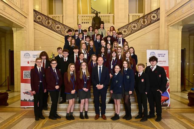 Communities Minister Gordon Lyons met with Year 10 students from Dalriada School, Ballymoney High School and Our Lady of Lourdes School at a Shared Education event at Parliament Buildings. CREDIT DFC