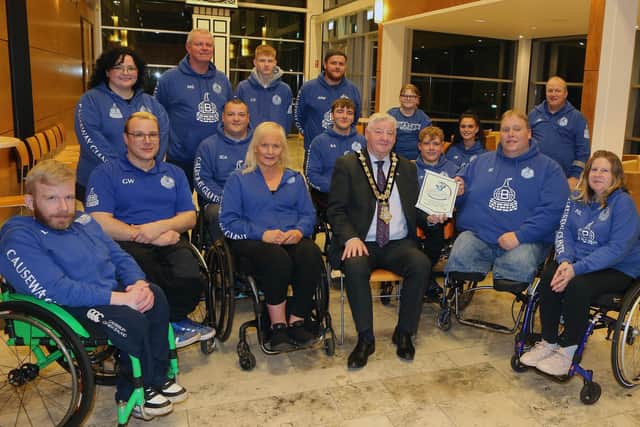 Causeway Giants Wheelchair Basketball team and club members pictured alongside the Mayor of Causeway Coast and Glens, Councillor Steven Callaghan, at a recent reception in Civic Headquarters Cloonavin. Credit Causeway Coast and Glens Council