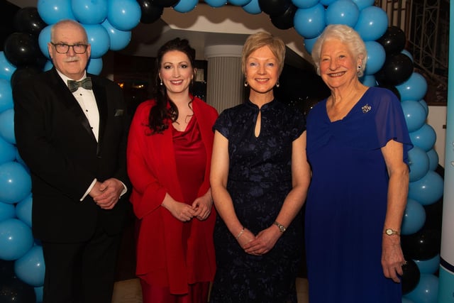 Happy faces at the Portadown College 100th anniversary dinner including from left, Peter Aiken, chairman of the school board of govenors; Emma Little Pengelly, Deputy First Minister; Miss Gillian Gibb, school principal and Lady Mary Peters. former pupil and Olympic gold medalist. PT11-214.
