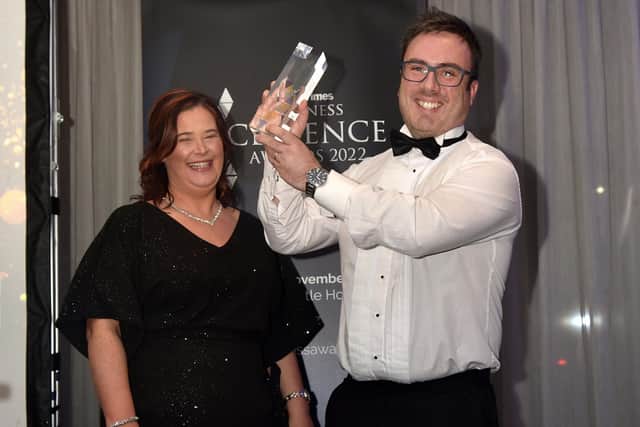 The winner of the Sustainable Business of The Year Award sponsored by Everun Ltd was Hampton Roast Coffee. The award was accepted by owner, Rhyan McCoy and presented by Diane Burke, Regional Director, National World, publishers of the Larne Times. LT48-200.