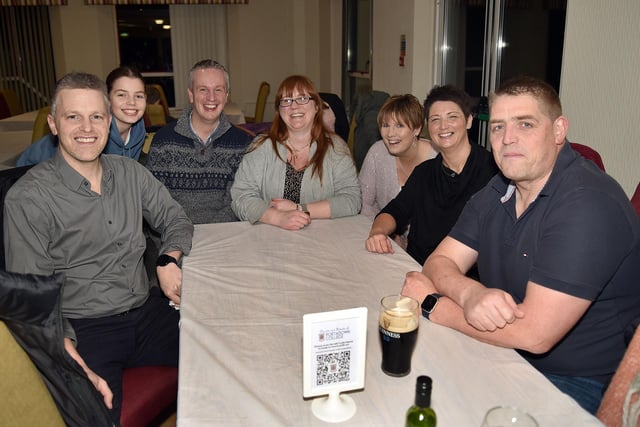 Posing for our photographer at the Parents and Friends of Portadown College quiz at Portadown Golf Club. PT09-229.