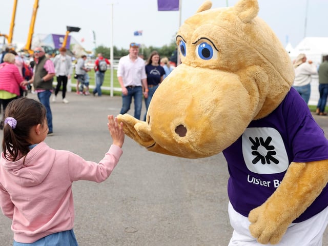 Enjoying a high five on day three of the Balmoral Show in partnership with Ulster Bank.