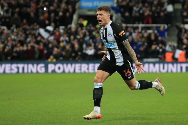 Newcastle United's English defender Kieran Trippier celebrates after scoring their third goal from a freekick during the English Premier League football match between Newcastle United and Everton at St James' Park in Newcastle-upon-Tyne, north east England on February 8, 2022.  (Photo by LINDSEY PARNABY/AFP via Getty Images)