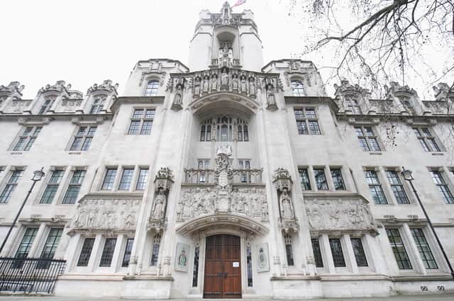The UK Supreme Court in Parliament Square, central London. A judgement will be delivered on Wednesday over whether men who identify as transgender can be regarded as female for the purposes of the 2010 Equality Act.