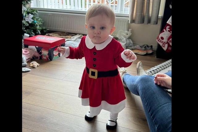 Lacie (10 months old) in her first festive outfit.