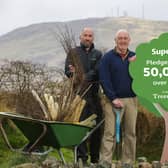 Frank McPolin, manager of Carlisle’s SuperValu in Ballynahinch (right) and colleague Alan McKibben (left) visit Declan McCann on his small holding in Dromara, who has received 275 trees from SuperValu’s partnership with Trees on the Land.