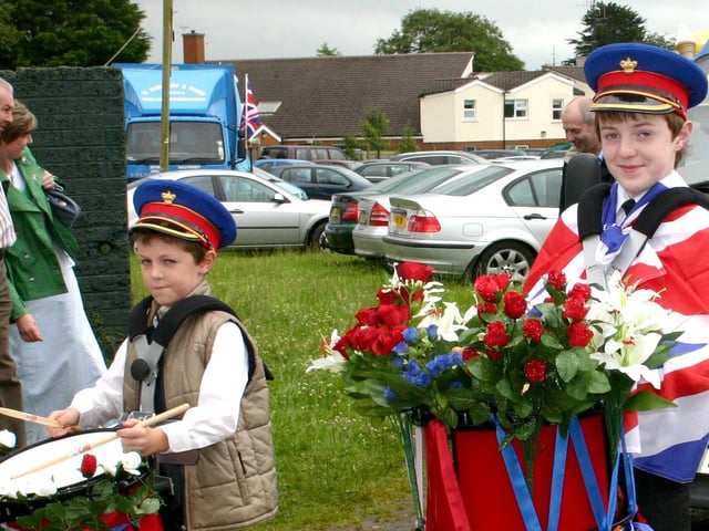 Decorating the drums with flowers at the 12th parade in Ballymoney in 2007.