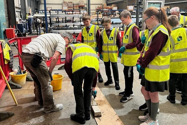 Pupils taking part in a hands-on session into the world of construction.