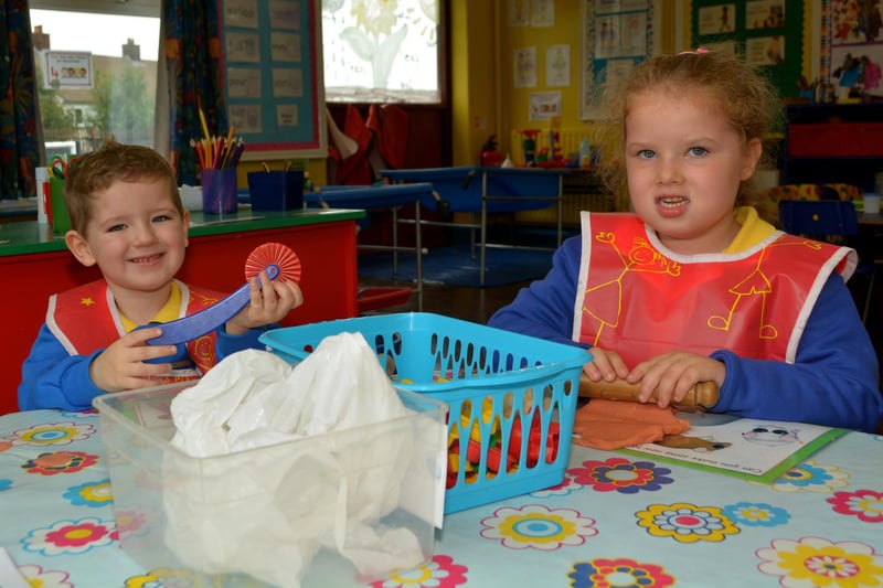 Lewis Garston and Demi Jeanette Sharkey getting to grips with the play dough on their first day at Sunnylands Primary School in 2014. INCT 36-140-GR
