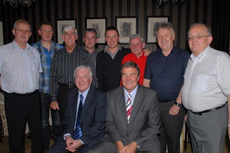 Ian Callaghan and Ron Yates with committee members of the Olderfleet Larne Liverpool FC Supporters' Club in 2009.